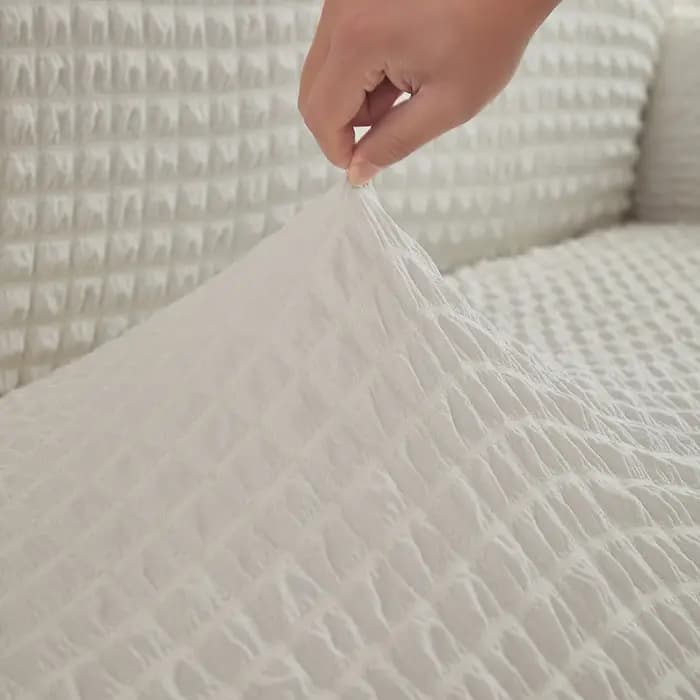 Juste de Protection Extensible pour Canapé d'Angle et Fauteuil