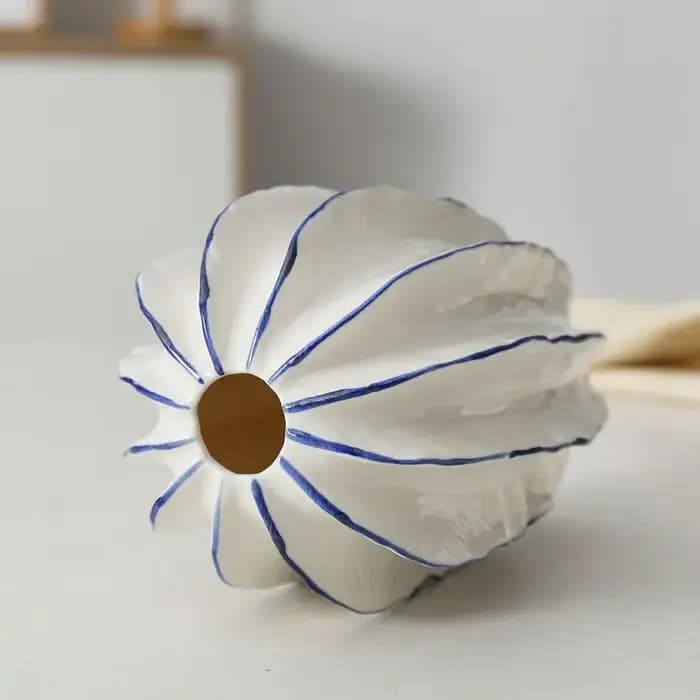 CAPIdepository-Figurine de carambole en céramique