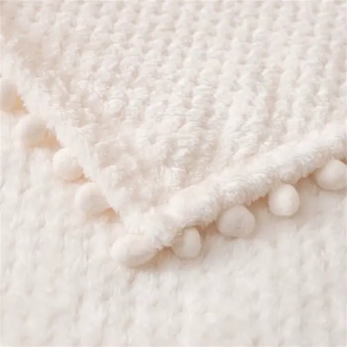 Couverture tricotée pour canapé