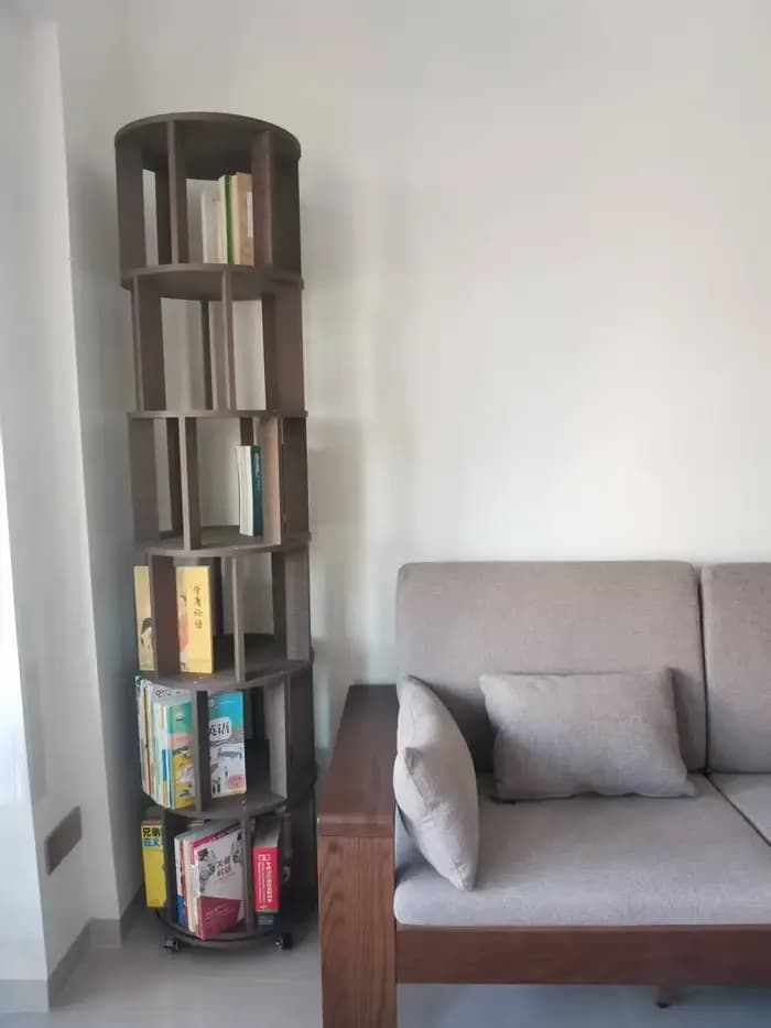Bibliothèque rotative en bois massif avec roulettes