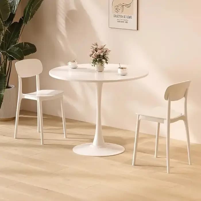 Table basse ronde blanche minimaliste pour le salon