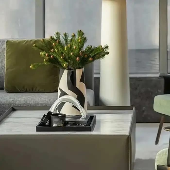 Table basse décorative torsadée en croix en verre