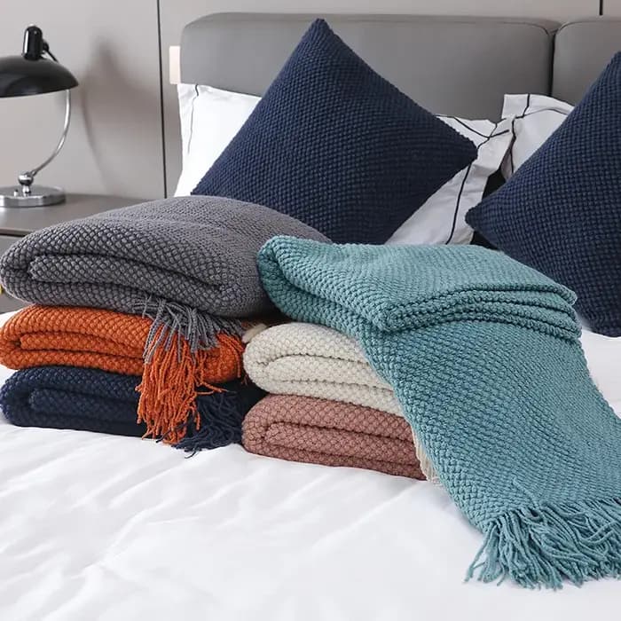 Couverture de canapé douce avec glands