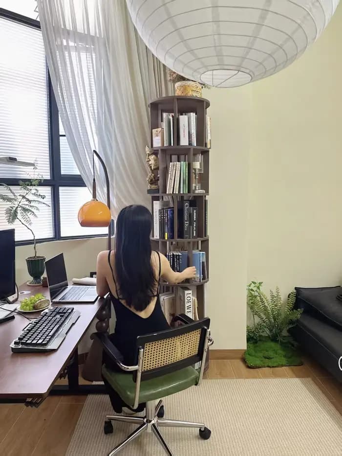 Bibliothèque rotative en bois massif avec roulettes