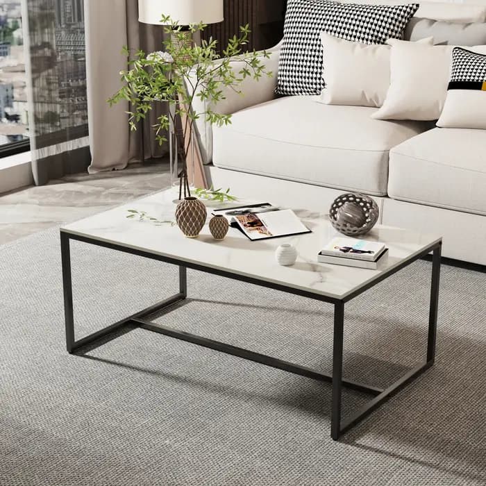 Table basse en pierre frittée avec cadre en métal noir
