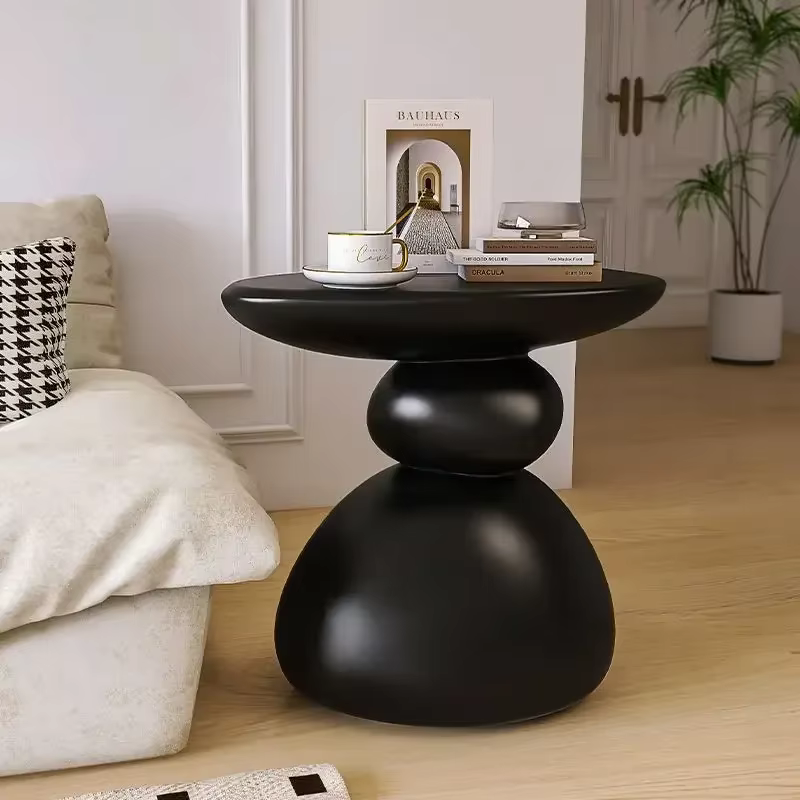 Table d'appoint moderne en forme de galet